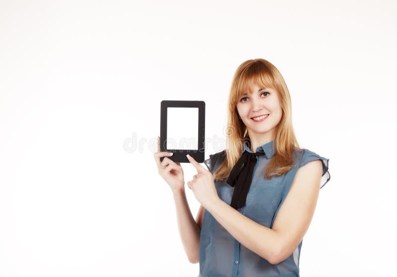 Young beautiful woman holding a tablet
