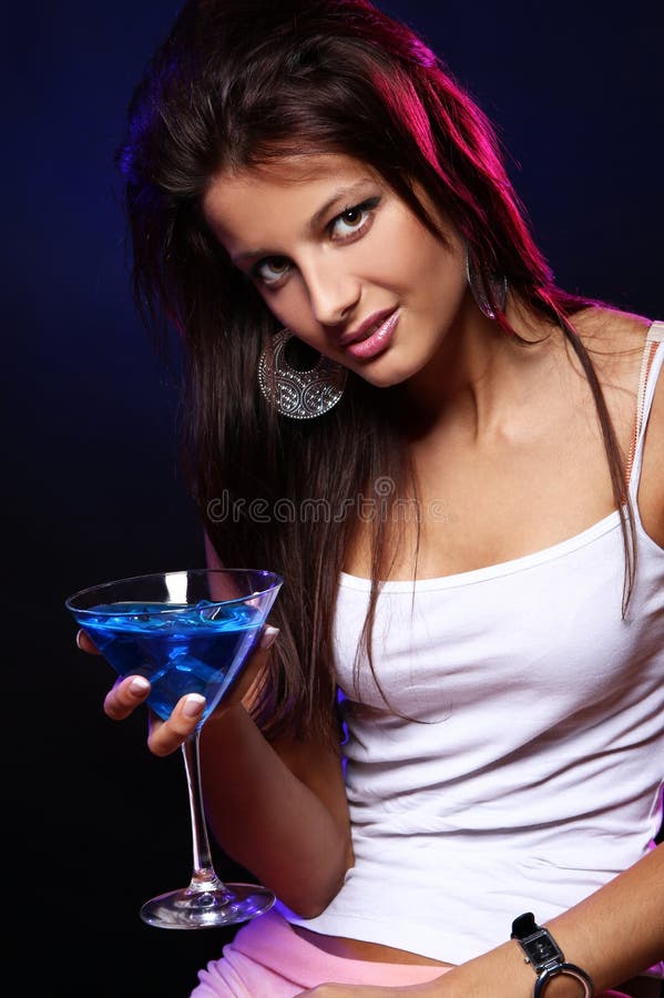 Young and beautiful woman in the nightclub