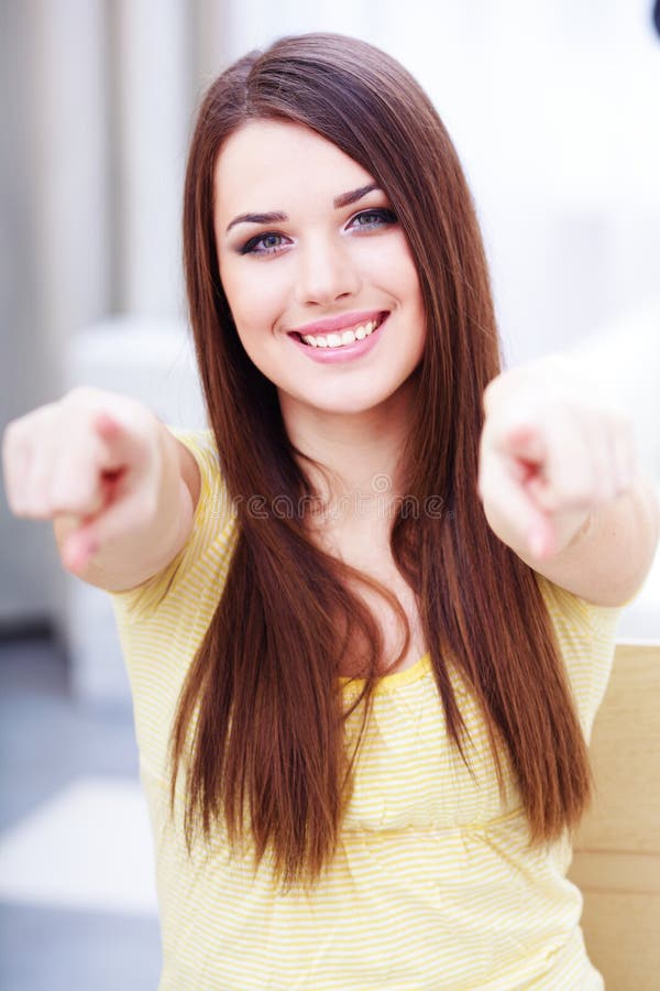 Young beautiful woman pointing on you stock images