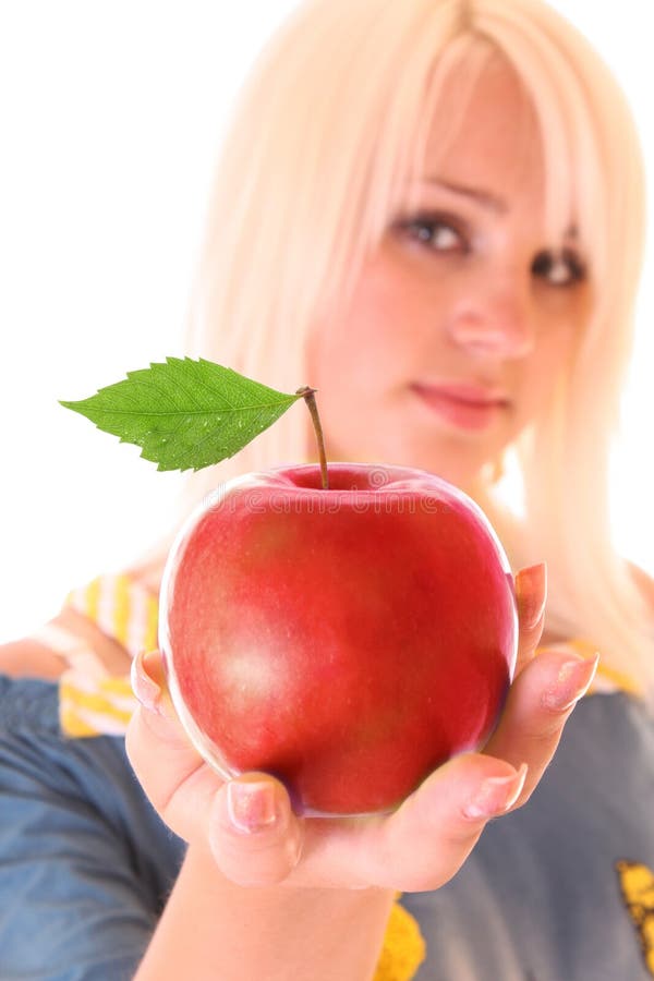 Young beautiful woman with red apple