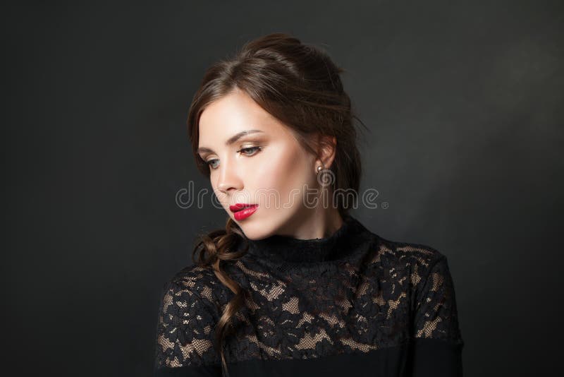 Young beautiful woman with red lips makeup hair on black background stock images Young beautiful woman with red lips makeup hair on black background stock images