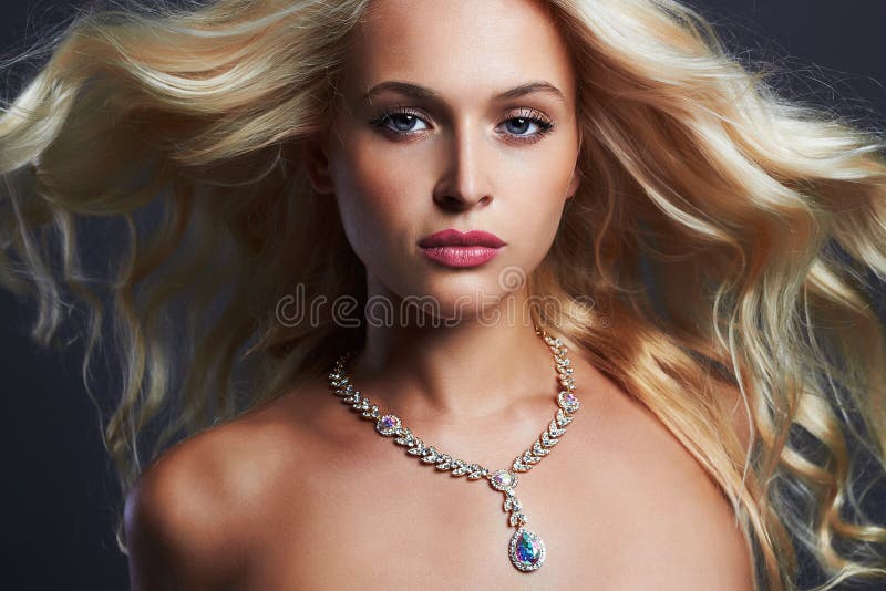 Young beautiful woman.Sexy Blond girl.jewelry