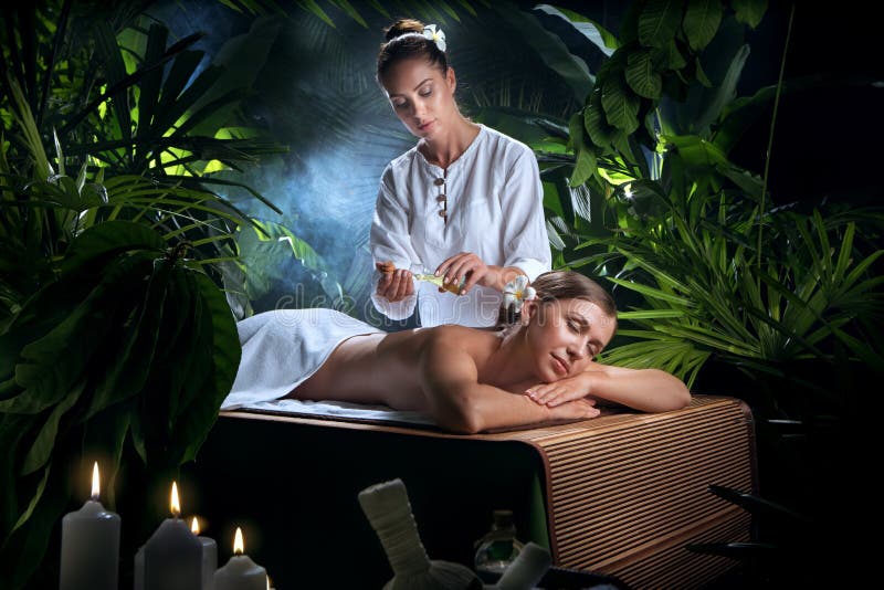 Of young beautiful woman in spa environment stock photos Of young beautiful woman in spa environment stock photos