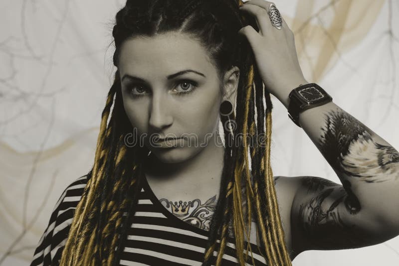 Young Beautiful Woman with Tattoo and Dreadlocks Stock Photo - Image of ...