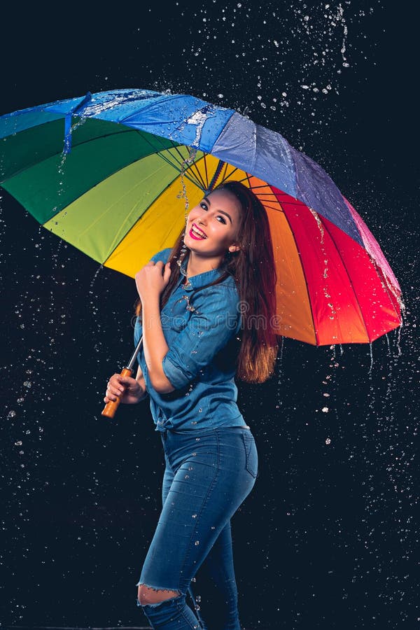 Young Beautiful Woman with an Umbrella. Stock Image Image of holding