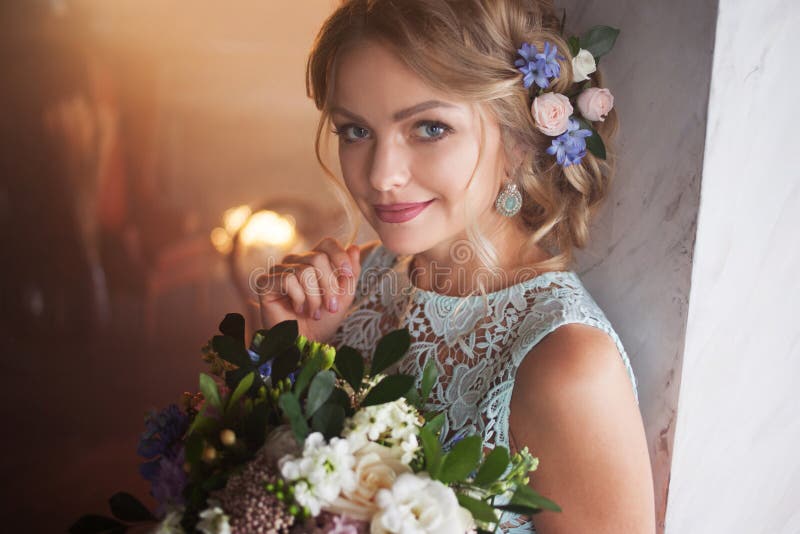 Young Beautiful Woman in Wedding Dress with Bouquet of Flowers. Wedding  Hairstyle, Flowers in Hair Stock Image - Image of caucasian, floral:  113358147