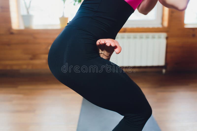 Full Length Portrait of Young Woman Doing a Yoga Pose Standing with One Leg  Raised Up. Stock Image - Image of exercise, girl: 133010173