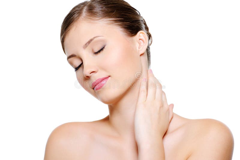 Young beauty female stroking neck stock photo Young beauty female stroking neck stock photo