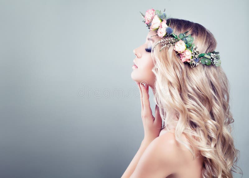 Young Beauty. Spa Girl with Pink Roses Flowers