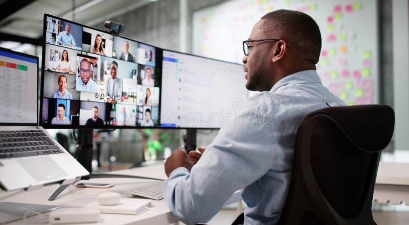 Young Black Man Using Laptop For Online Video Interviews stock image