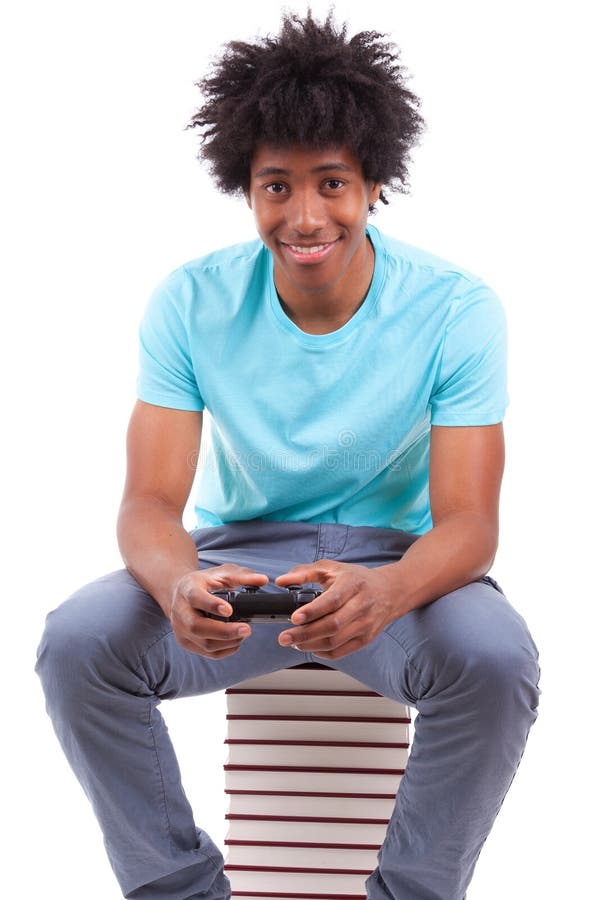 Having Fun at Home. Cheerful Black Teen Guy with Joystick Playing Online  Computer Games, Sitting on Couch Indoors Stock Image - Image of computer,  person: 227478857