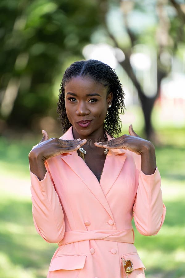 Young Black Woman in Business Attire Strikes Confident Pose Outside Stock Image Image of black natural 274231947