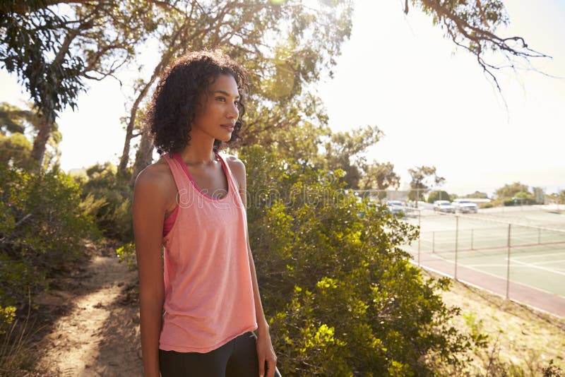 Young Black Woman Taking a Break during Her Run Stock Image - Image of ...