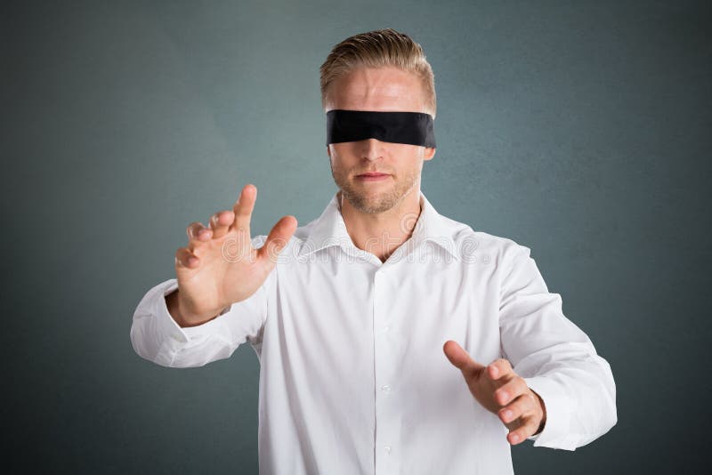 Male And Female Models Having Blindfolds And Lines On Face Stock