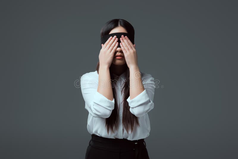 Young Woman Wearing Black Blindfold Isolated On Grey Stock Photo, Picture  and Royalty Free Image. Image 114818746.