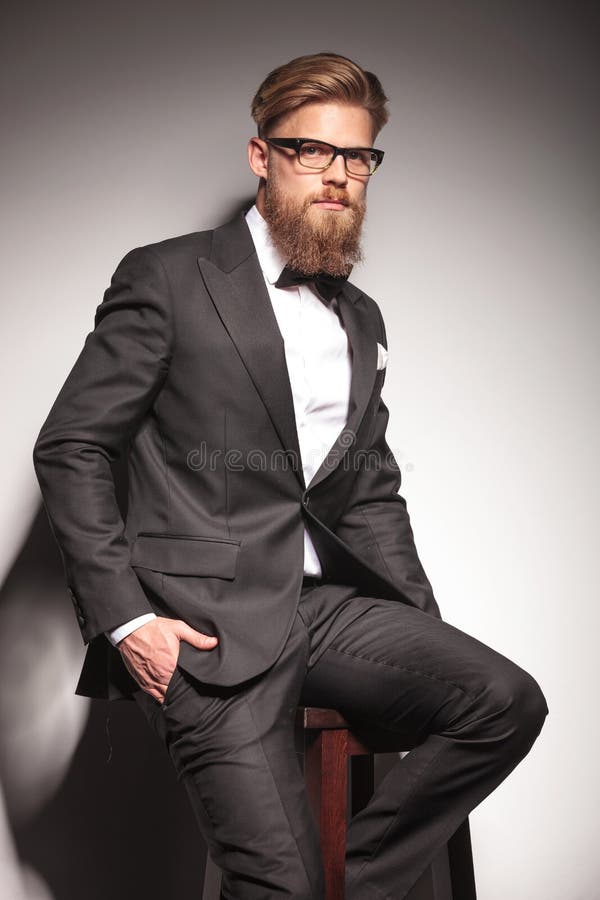 Seated Fashion Man with Beard and Glasses Stock Image - Image of brown ...