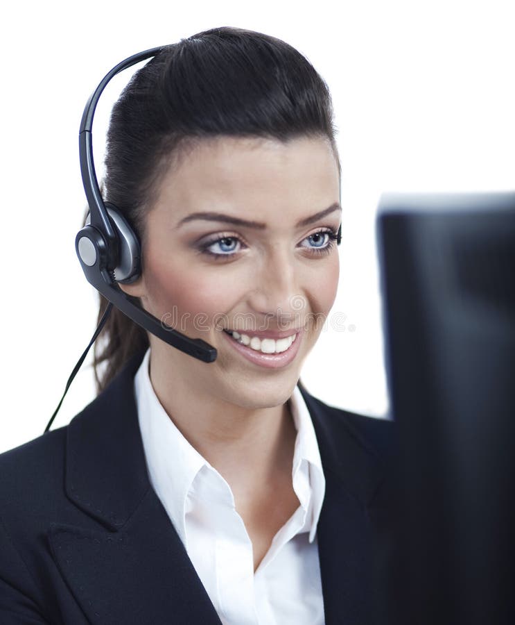 Young blond business woman with headset closeup