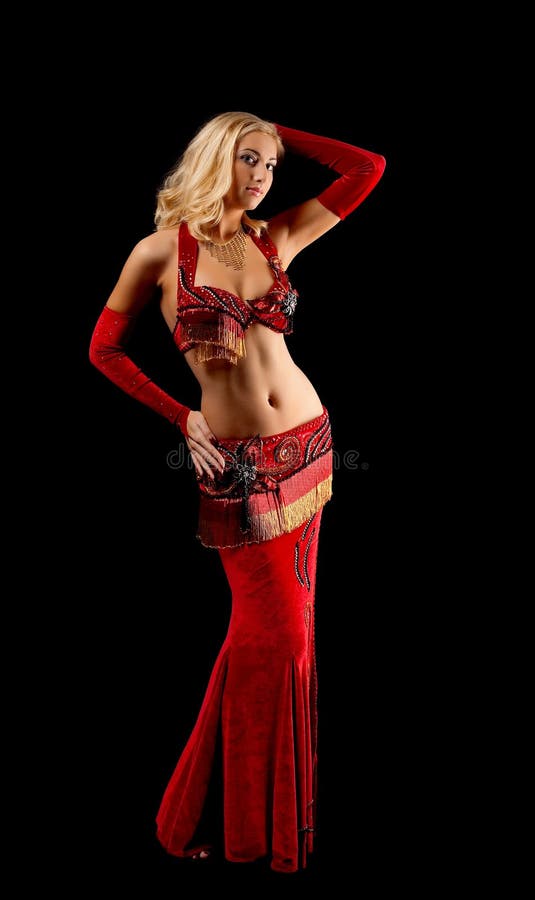 Young blond girl in dance - red arabian costume stock photo Young blond girl in dance - red arabian costume stock photo