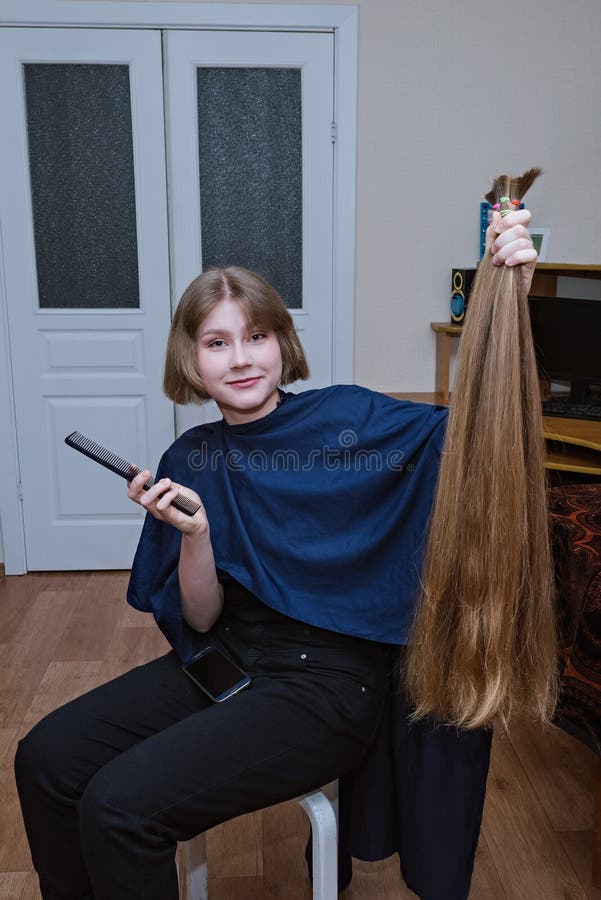 Young Blonde Girl Cut Very Long Hair at Home Stock Image - Image of  epidemic, attractive: 184222013