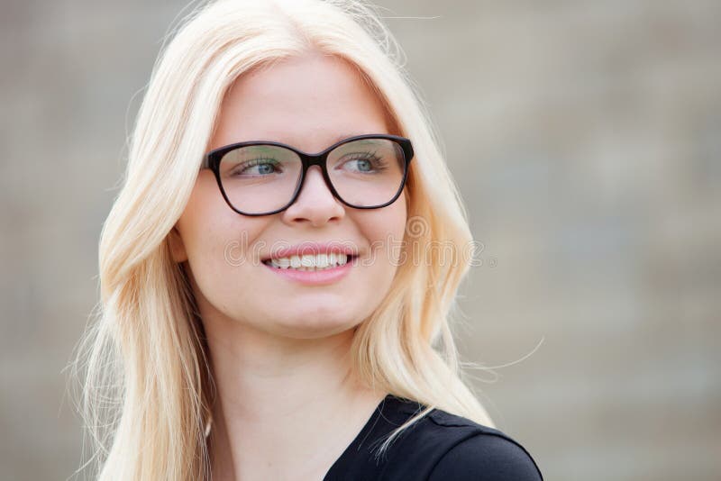 Young Blonde Girl With Glasses Smiling Stock Ima