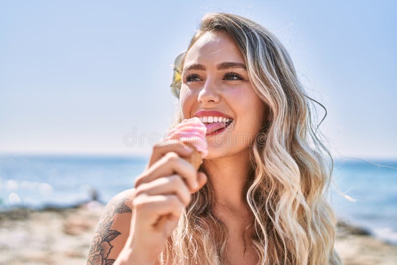 Blonde girl in bikini sunbathing - wide 5