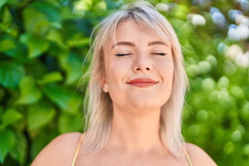 Young Blonde Woman Breathing With Closed Eyes At Park Stock Image Image Of Portrait Fashion 