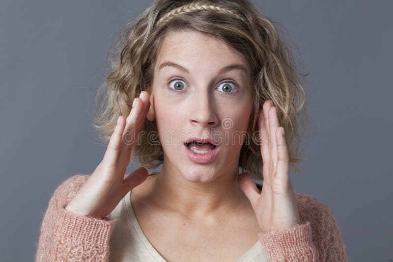 Young blonde woman looking stunned royalty free stock images Young blonde woman looking stunned royalty free stock images