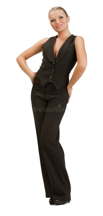 Young blonde woman in a trouser suit posing