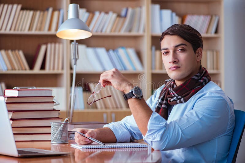 The young book writer writing in library