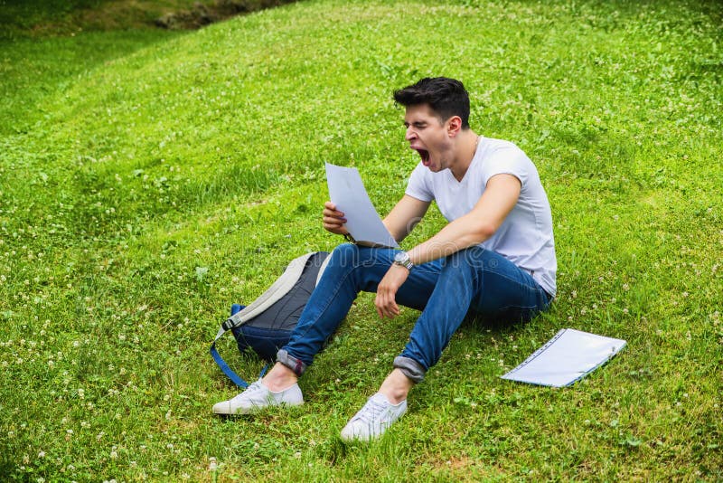 Young Bored, Tired Male Student Studying in City stock images Young Bored, Tired Male Student Studying in City stock images