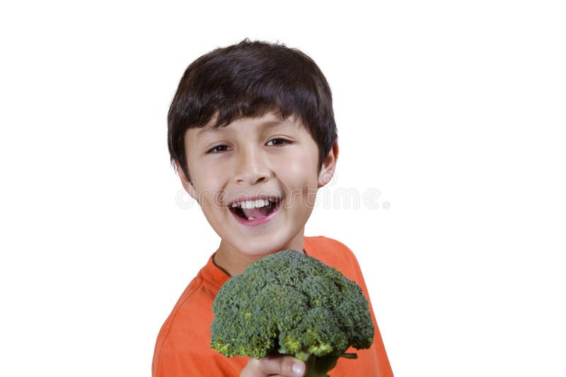 Young boy with broccoli stock image. Image of child, smiling 49521327