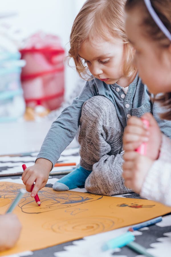 Young Boy Drawing with Classmate Stock Photo - Image of classes, learn ...