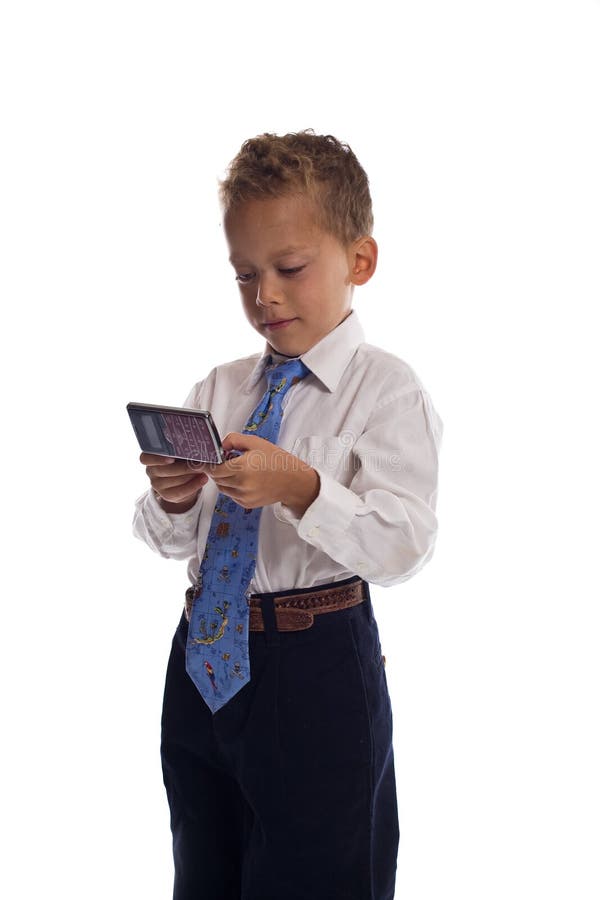 Young boy dressed as businessman sends SMS