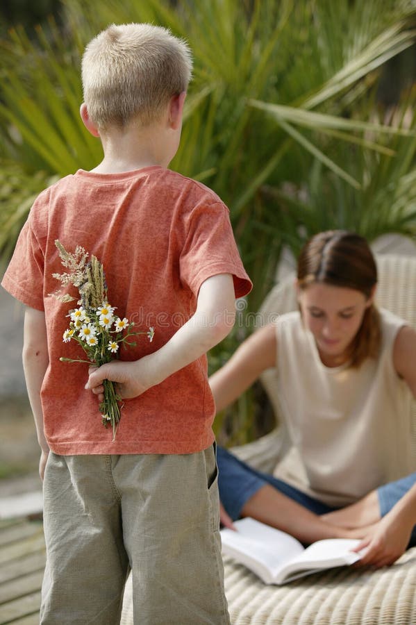 Young boy with flowers