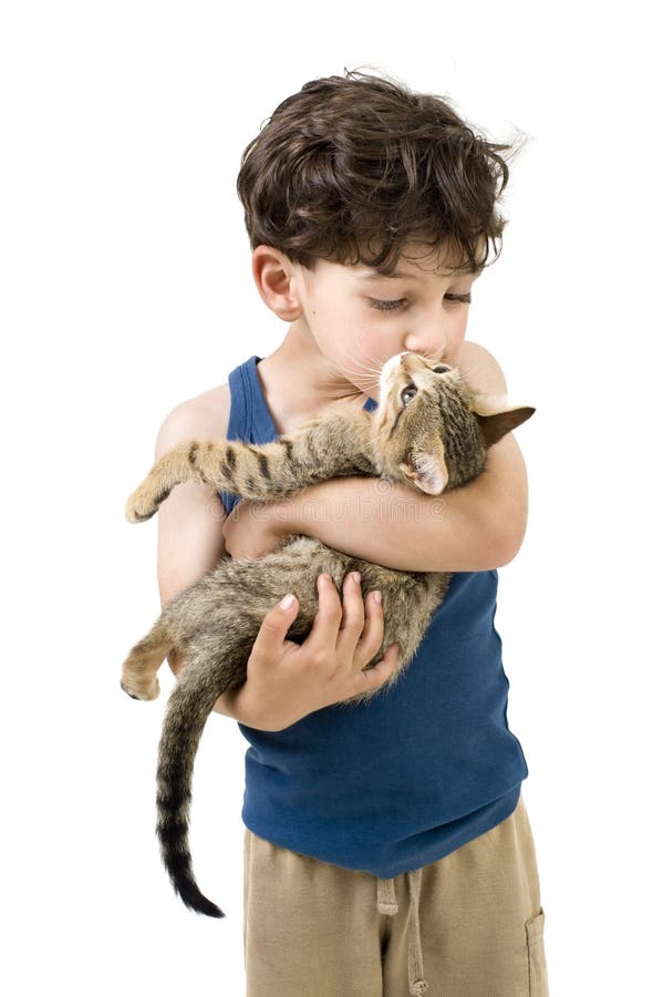 Young boy holding kitten stock photo. Image of casual 14754354
