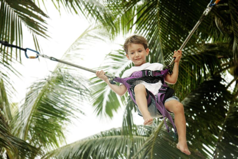 Young boy jumping bungee