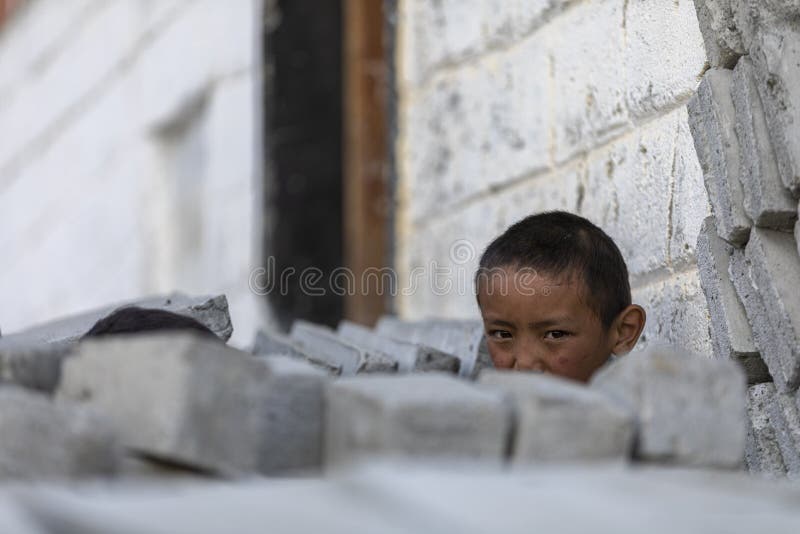 Profile of a Teenage Indian Boy Looking at outsides Stock Photo