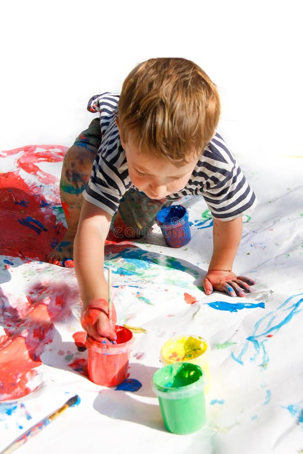 Young boy painting