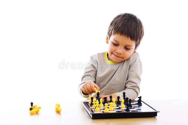 Boy playing chess royalty free stock images Boy playing chess royalty free stock images
