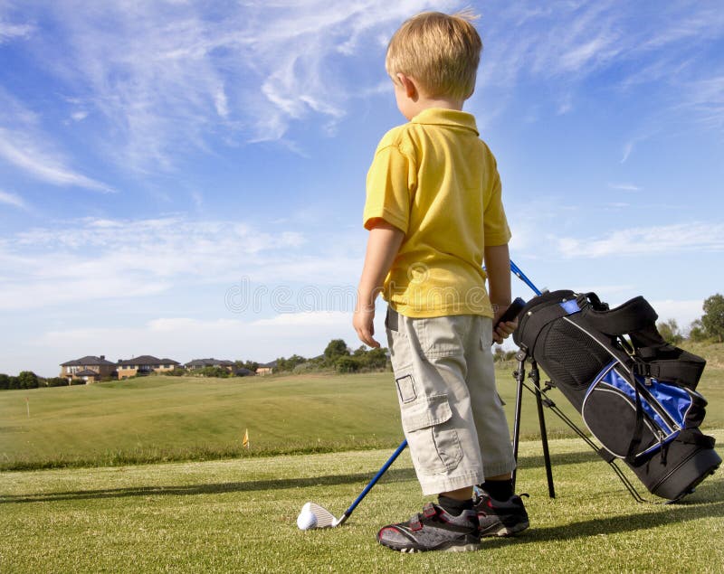 Young boy playing Golf stock image. Image of child, handsome 18073709