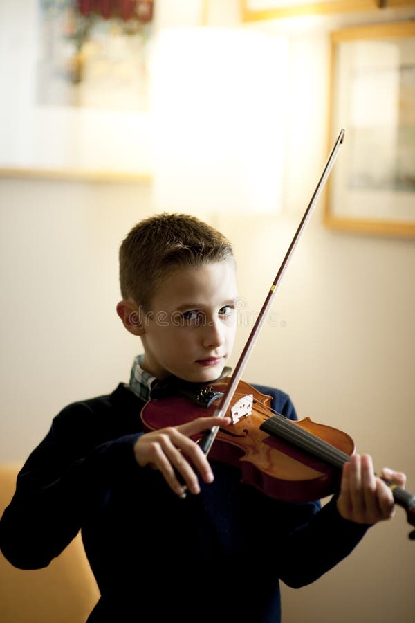 Young boy playing violin