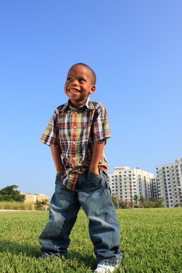 Young Boy Posing on the Grass