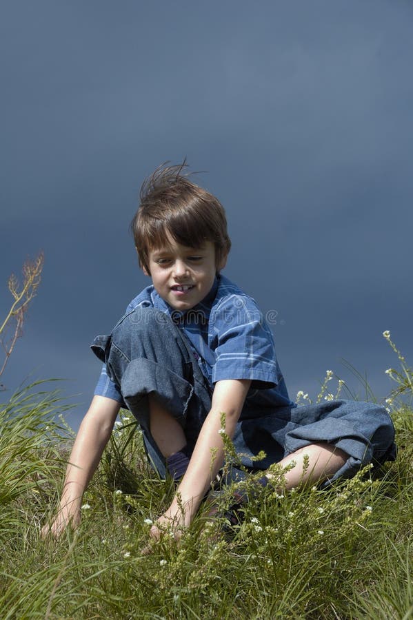 Young Boy Posing Outdoors