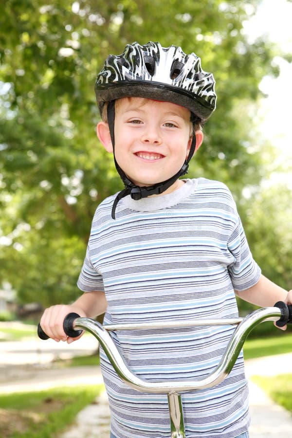 Young boy on a bike stock photo. Image of male, recreation 17769290