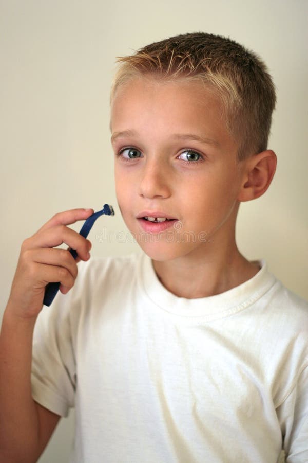 Young boy shaving stock photo. Image of healthy, shave 1404682