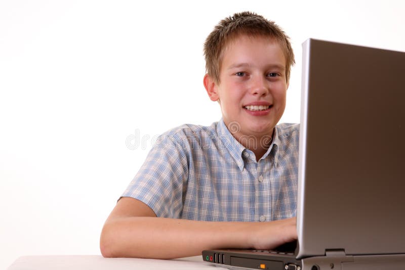 Young boy spending time with notebook stock photo