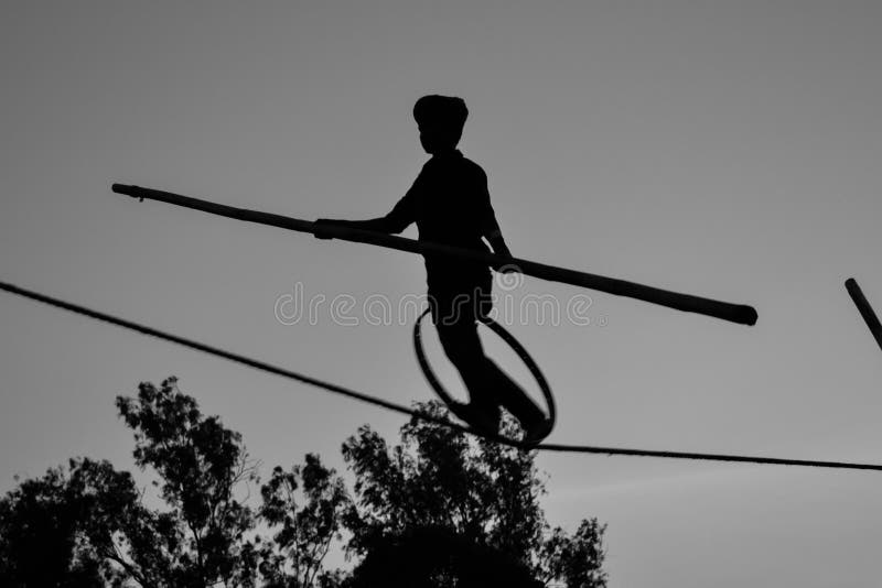 Young Boy Tightrope Walking, Slacklining, Funambulism, Rope Balancing