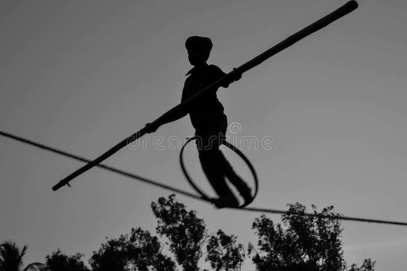 Young Boy Tightrope walking, Slacklining, Funambulism, Rope Balancing