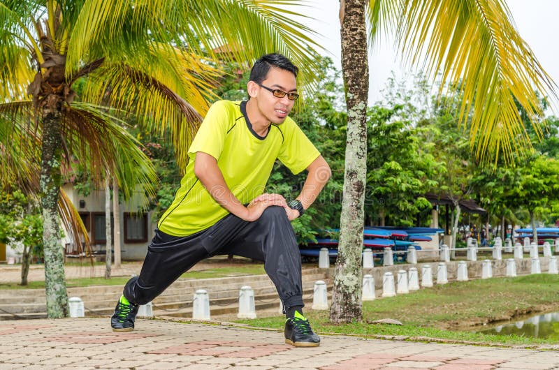 Young boy warming up royalty free stock photo