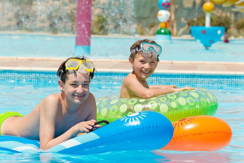 Young Boys in Swimming Pool Stock Photo Image of kids, active 20336620